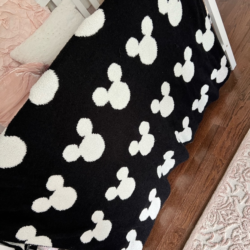 Reversible Mickey Mouse plush throw blanket.